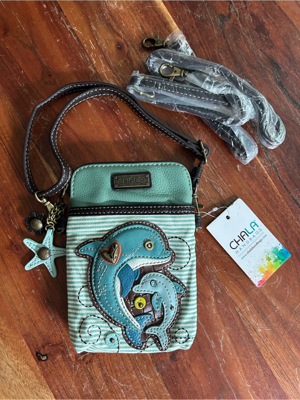 NWT Chala Crossbody Cell Phone Purse in teal stripe playful dolphin